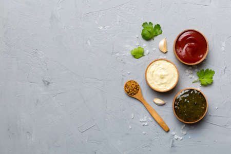 Many different sauces and herbs on table, flat lay top view. sauces with spices healthy concept.の写真素材