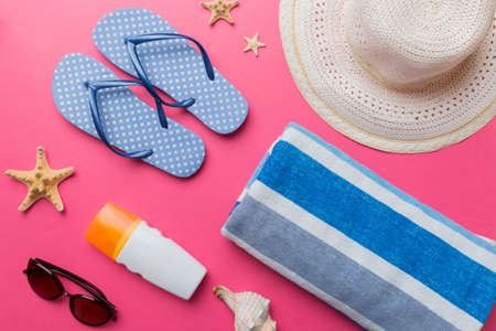 Summer vacation concept flat lay. beach accessories and towel top view. Space for text. travel concept.の写真素材