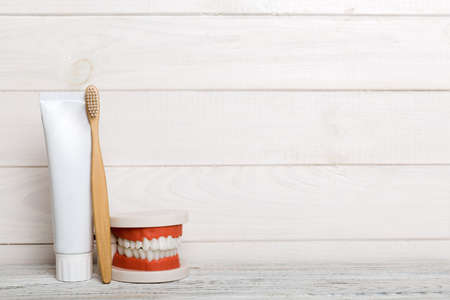 Mouthwash and other oral hygiene products on colored table top view with copy space. flat lay. dental hygiene. oral care kit. Dentist concept.の写真素材