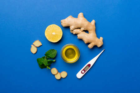 Natural cold and flu home remedies and thermometer. Natural ingredients for immunity stimulation and...