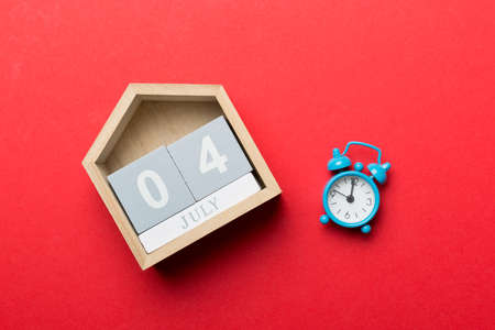 4th of July calendar. Independence day reminder concept. Wooden calendar with 4th July date. America independence day concept.の写真素材