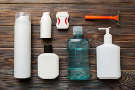 Mockup for bathing products top view flat lay, spa razor, toothpaste, soap, gel and other various accessories. Cosmetics for skin health. Bath Mockup for your logo.の写真素材