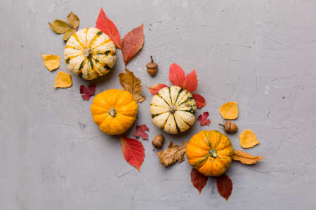 autumn composition. Pattern made of dried leaves and other design accessories on table. Flat lay, top view.の写真素材