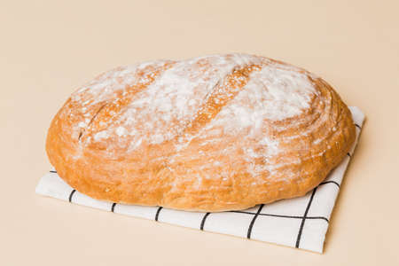 Fresh homemade crispbread on napkin, top view. Healthy unleavened bread. French bread. Top view...