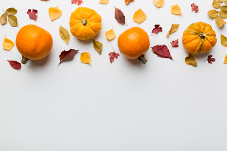 autumn composition. Pattern made of dried leaves and other design accessories on table. Flat lay, top view.の写真素材