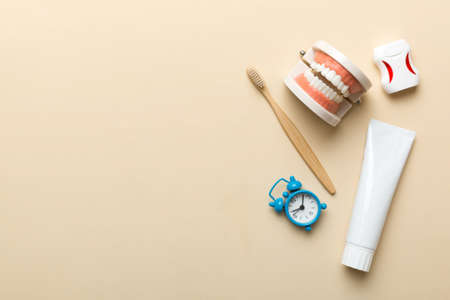 Mouthwash and other oral hygiene products on colored table top view with copy space. flat lay....