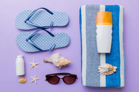 Summer vacation concept flat lay. beach accessories and towel top view. Space for text. travel...