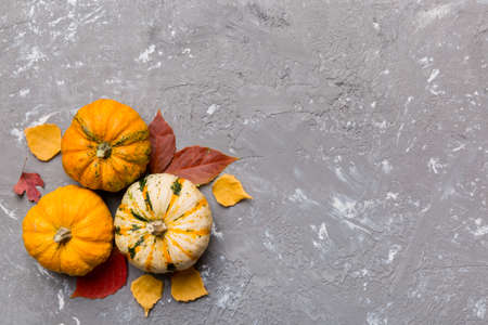 autumn composition. Pattern made of dried leaves and other design accessories on table. Flat lay, top view.の写真素材