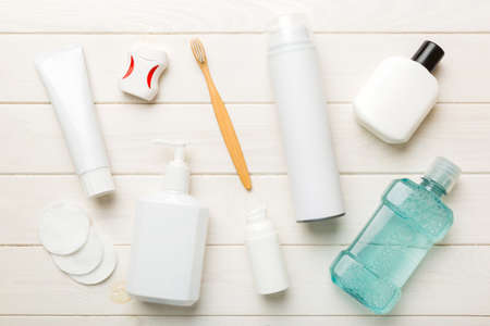 Mockup for bathing products top view flat lay, spa razor, toothpaste, soap, gel and other various...