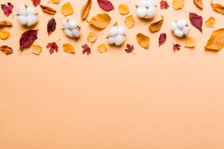 autumn composition. Pattern made of dried leaves and other design accessories on table. Flat lay, top view.の写真素材