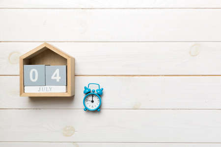 4th of July calendar. Independence day reminder concept. Wooden calendar with 4th July date. America independence day concept.の写真素材