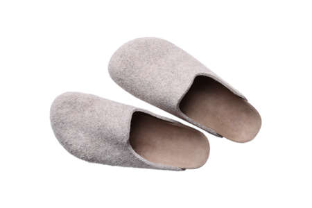 Pair of soft home felt or wool slippers isolated on white background top view.の写真素材