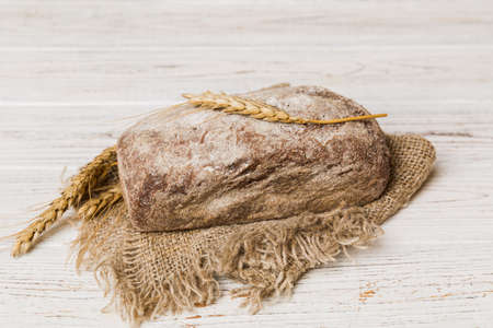 Fresh homemade crispbread on napkin, top view. Healthy unleavened bread. French bread. Top view...