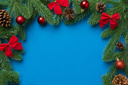 Christmas background with fir branches and Christmas decor. Top view, copy space for text.の写真素材