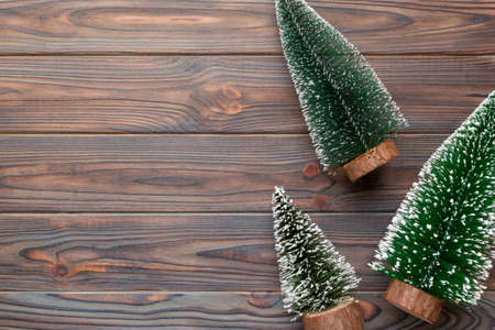 Flat lay composition with christmas trees on color background. Top view with copy space.の写真素材