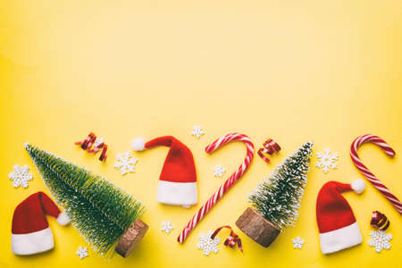 Flat lay composition with christmas trees on color background. Top view with copy space.の写真素材