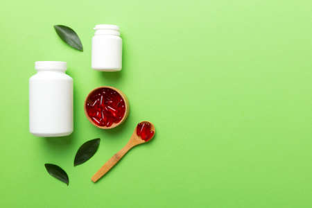 different drugs and health supplement pills with medicine bottle health care and medical top view....