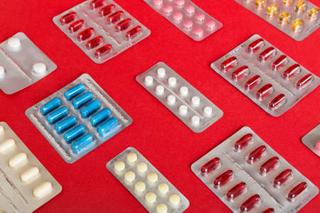 too many different pills of various blisters with differents Medicines storage at home pill concept...
