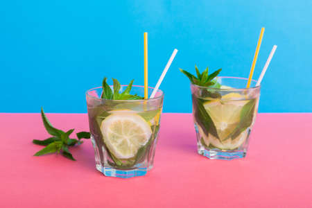 Mojito summer refreshing cocktail with ice and mint. mojito cocktail with lime, lemon and mint in a...