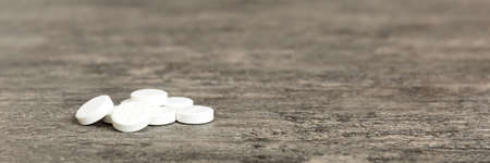 Collection Of Various Medical Tablets And Pills. Assorted pharmaceutical medicine pills, tablets and capsules on table background. Heap of assorted various medicine tablets. health care.の写真素材