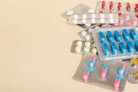 too many different pills of various blisters with differents Medicines storage at home pill concept Medication storing. A pile of medicine in blister packs. Pharmaceutical blister packs.の写真素材