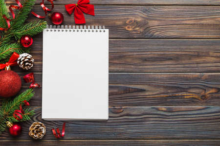 Christmas blank greeting card mock-up scene. Creative layout made of Christmas tree branches and...