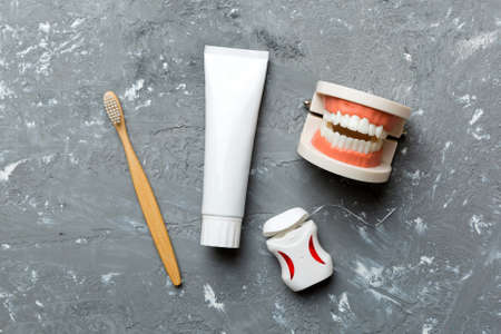 Mouthwash and other oral hygiene products on colored table top view with copy space. flat lay....