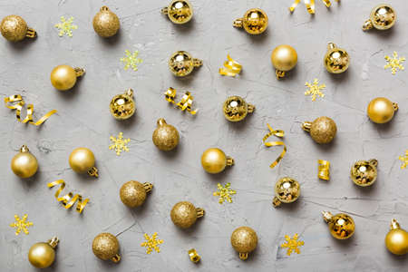 christmas composition. a pattern of christmas balls on colored background. Flat lay, top view New year decor.の写真素材