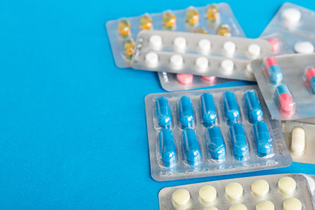 too many different pills of various blisters with differents Medicines storage at home pill concept...
