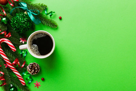 Delicious fresh festive morning coffee in a ceramic cup with little wrapped gifts, ornament and xmas...