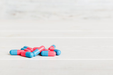 Collection Of Various Medical Tablets And Pills. Assorted pharmaceutical medicine pills, tablets and capsules on table background. Heap of assorted various medicine tablets. health care.の写真素材
