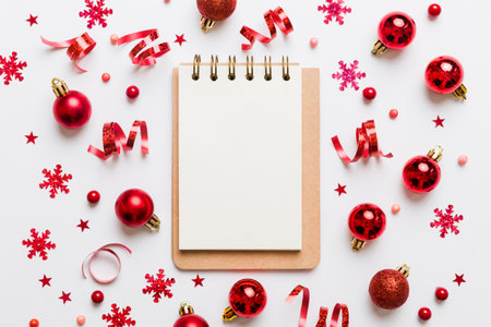 Christmas blank greeting card mock-up scene. Creative layout made of Christmas tree branches and paper card note. flat lay. Nature New Year concept.の写真素材