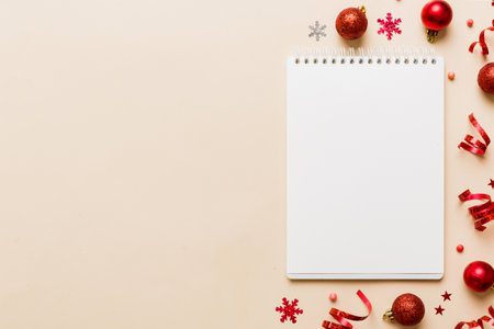 Christmas blank greeting card mock-up scene. Creative layout made of Christmas tree branches and paper card note. flat lay. Nature New Year concept.の写真素材