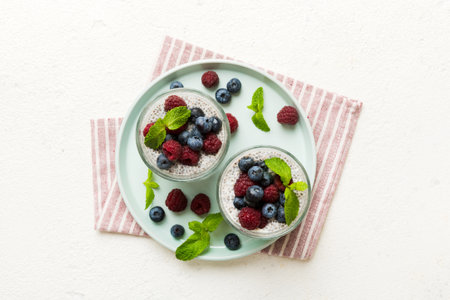 Healthy breakfast or morning with chia seeds vanilla pudding raspberry and blueberry berries on...