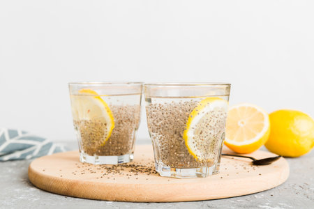 Healthy breakfast or morning with chia seeds and lemon on table background, vegetarian food, diet and health concept. Chia pudding with lemon.の写真素材