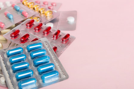too many different pills of various blisters with differents Medicines storage at home pill concept Medication storing. A pile of medicine in blister packs. Pharmaceutical blister packs.の写真素材