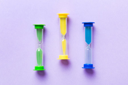 hourglass on the table, sand clock as time passing concept for business deadline, copy space.