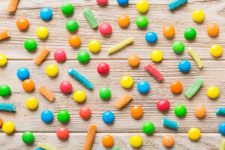 colorful candies as background top view. Seamless pattern with candy. Many sweet candies close-up.の写真素材