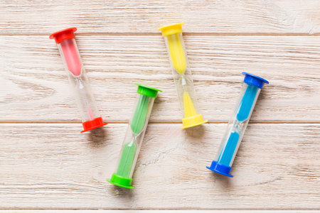 hourglass on the table, sand clock as time passing concept for business deadline, copy space.