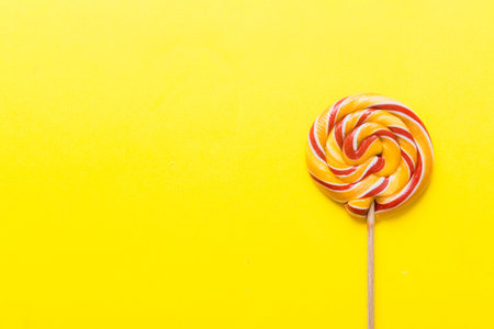 Set of colorful lollipops on colored background. summer concept. Party Happy Birthday or Minimalist Concept.の写真素材