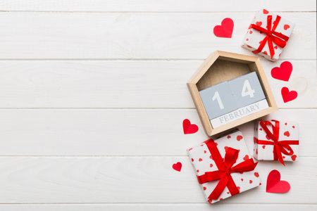 Valentine Day theme with wooden block calendar. Greeting card template for Valentines Day.copy space...
