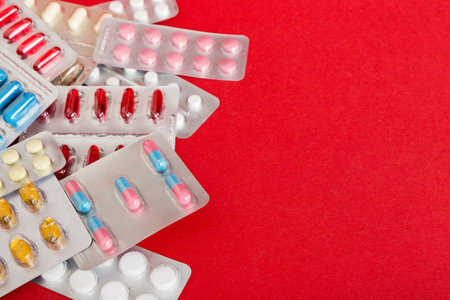 too many different pills of various blisters with differents Medicines storage at home pill concept...