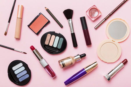 professional makeup tools. top view. flat lay. Beauty, decorative cosmetics. Makeup brushes set and color eyeshadow palette on table background. minimalistic style.の写真素材