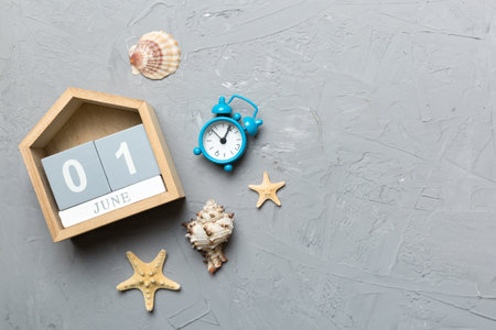 June 1st. Image of june 1 wooden calendar on colored background. summer day. Empty space for text.の写真素材