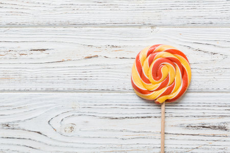Set of colorful lollipops on colored background. summer concept. Party Happy Birthday or Minimalist Concept.の写真素材