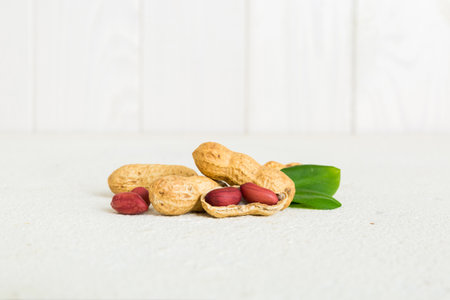 Fresh healthy peanut on colored table background. Top view Healthy eating concept. super foods.の写真素材