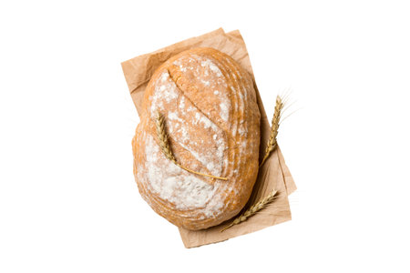 Fresh Homemade Whole Wheat Bread. bread on napkin isolated on white background, fresh bread top view.の写真素材