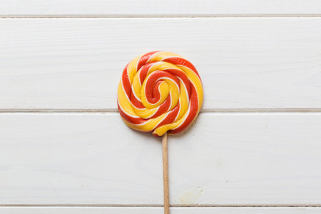 Set of colorful lollipops on colored background. summer concept. Party Happy Birthday or Minimalist Concept.の写真素材