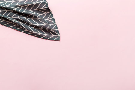 top view with blue kitchen napkin isolated on table background. Folded cloth for mockup with copy space, Flat lay. minimal style.の写真素材