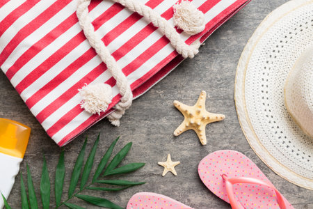 Summer vacation concept flat lay. beach accessories and towel top view. Space for text. travel...